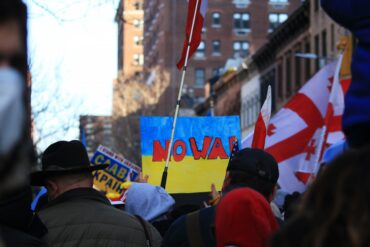 Sunday, February 27, 2022, Protesters gathered outside of Russian Consulate in uptown New York City to protest Russian's invasion in Ukraine. Sign reads "NO WAR".