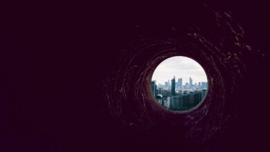 Photo of a dark hole leading up to Canary Wharf, London (the banking district)