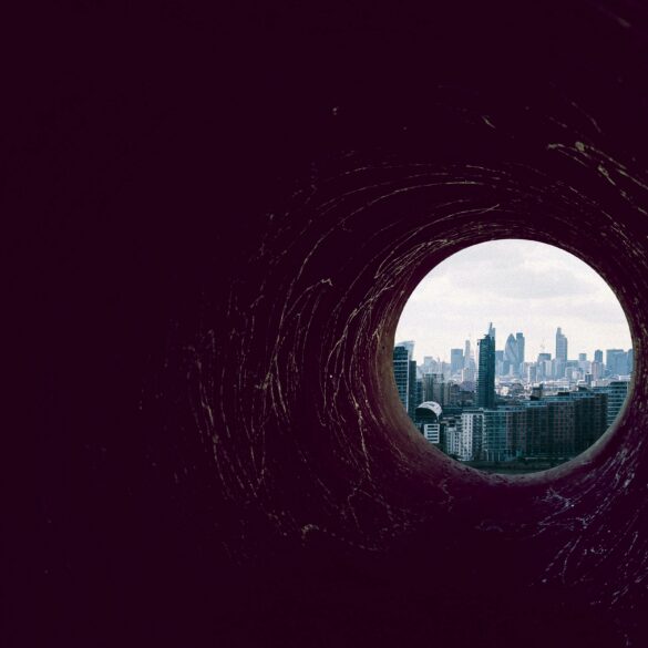 Photo of a dark hole leading up to Canary Wharf, London (the banking district)