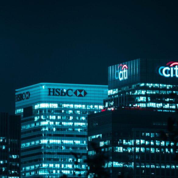 Photo of Canary Wharf, London, at night, showing the banks.