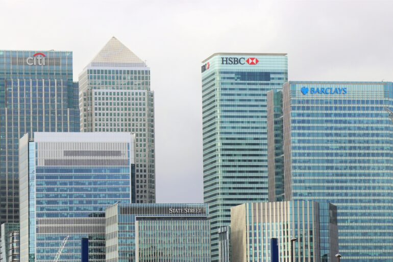 Photo of banks in Canary Wharf, London. Image includes the UK headquarters of HSBC, Barclays, Citi, and State Street, among others