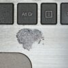 Photo of a clear fingerprint mark left on a Laptop surface with black-ink