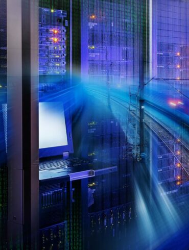 Photo of a server room with a blue coloured technological overlay swooshing across