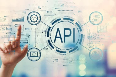 Finger pointing at digital graphic of internet writing API in the middle